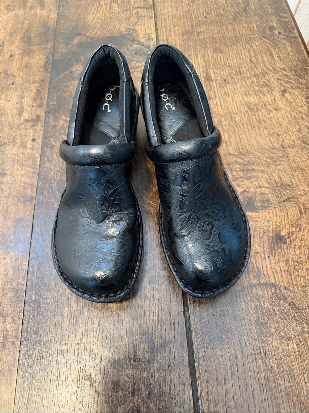 b.o.c. Black Floral-Embossed Clogs with Slight Heel